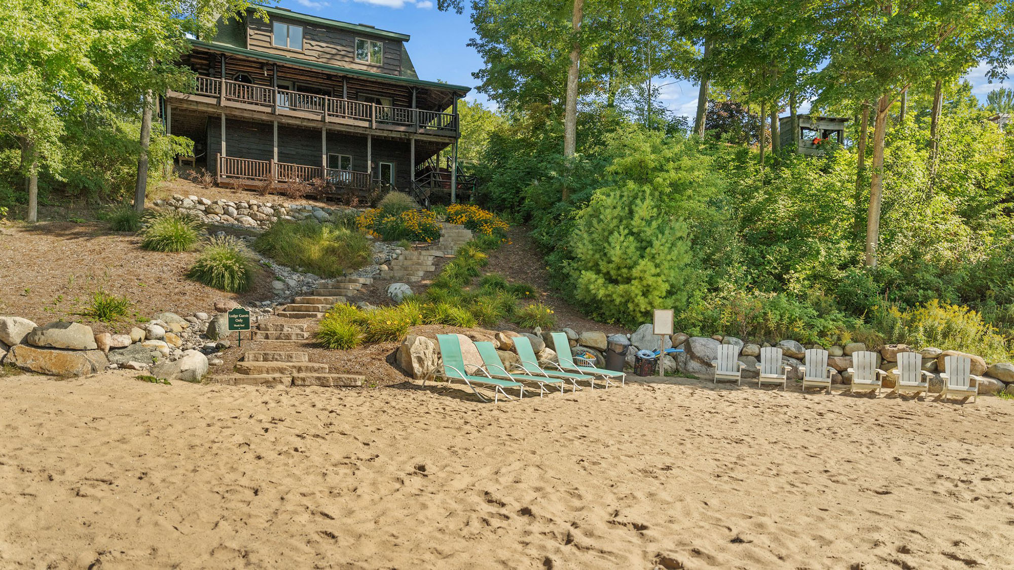 Private Beach with The Lodge on the Hill at Sleeping Bear Resort